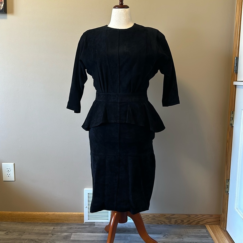 Black suede, leather, three-quarter sleeve dress with open back